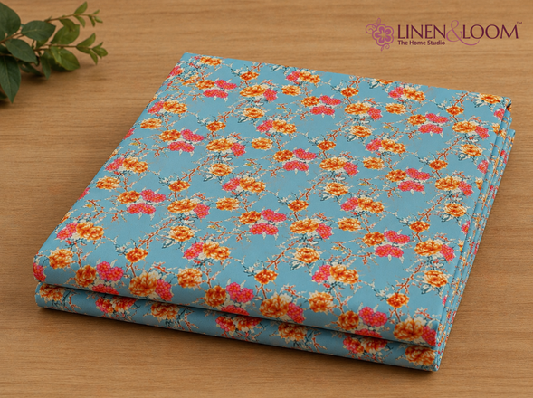Floral fabric on a wooden surface with 'Linen & Loom' branding.